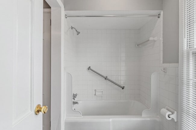 Building Photo - Large Brick Ranch, New Wood Like Flooring Throughout, Just Painted, LR, Den, Sun Room, Carport!