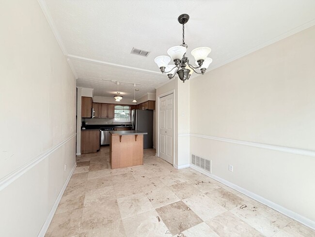 Building Photo - Spacious Living, Modern Updates & Fully Fenced Yard