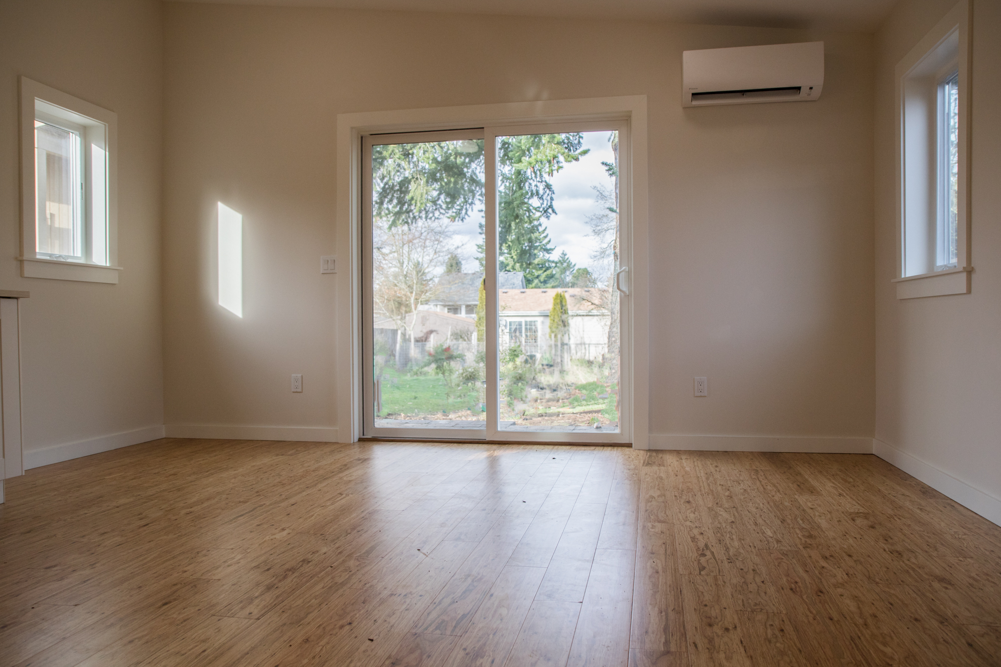 View out to the backyard from the main living space (kitchen/living area). - 5239 NE Mason St