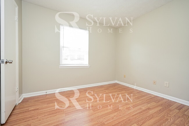 Building Photo - The living is easy in this 3 bedroom, 2 bathroom home