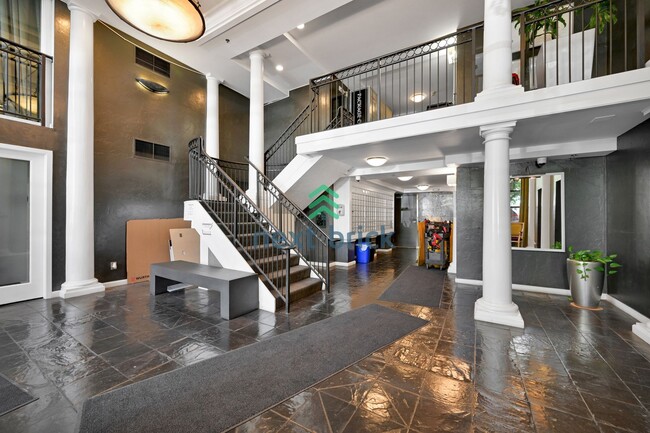 Building Photo - Modern Studio with Sleeping Alcove & Incre...