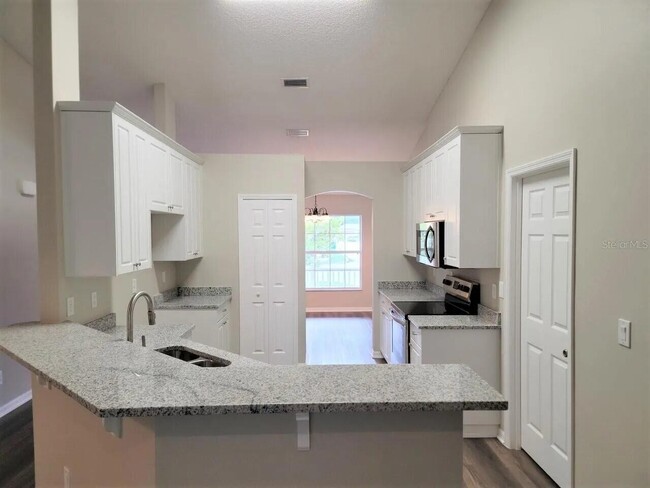 Building Photo - 5551 Cinnamon Fern Blvd