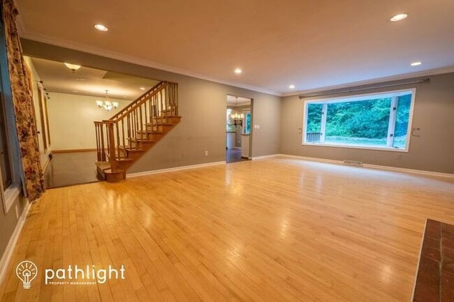 Building Photo - 5631 Whispering Pines Drive