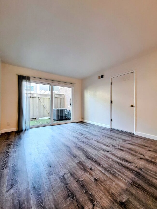 Building Photo - Spacious Two-Story 3bd Townhouse With Private Patios, Balcony, & Garage