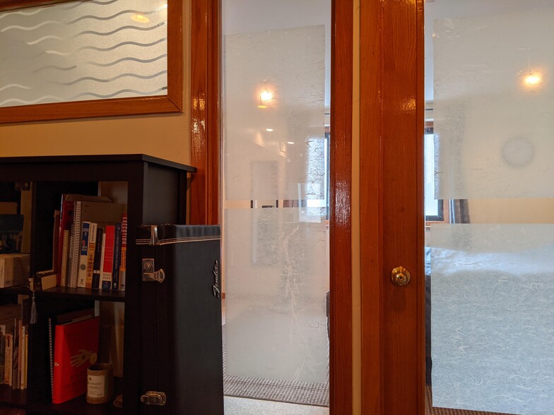 Looking into the bedroom from the living room/library. - 109 S 22nd St