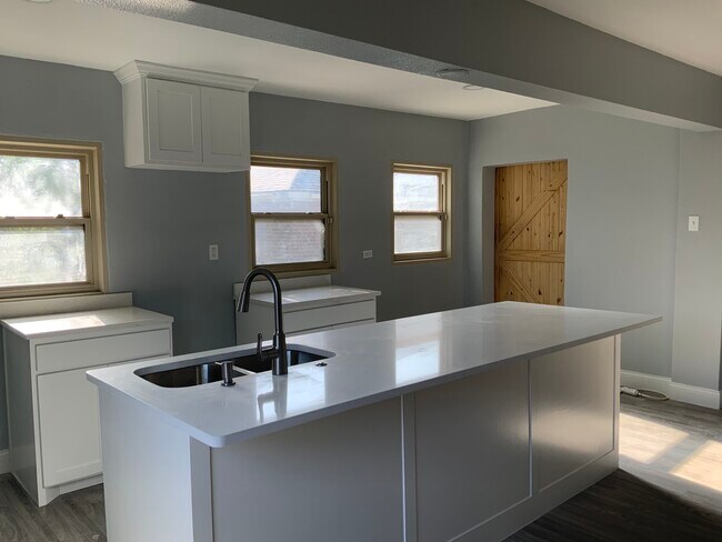 Kitchen- barn door to sunroom closed - 3816 Byers Ave