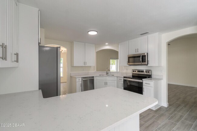 Building Photo - 1431 Victory Palm Dr