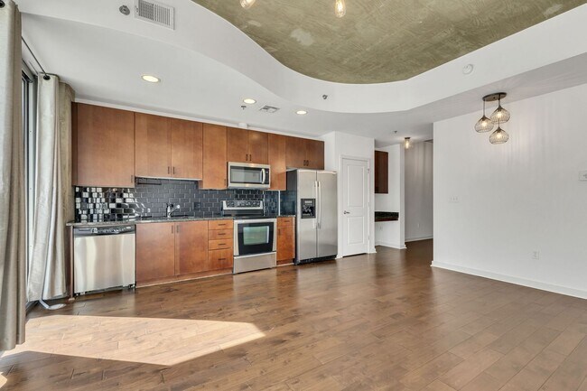Building Photo - Stunning condo in the heart of SoBro at the Encore! Beautiful 1 bed, 1 bath on the amenity floor ...