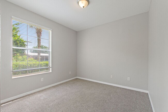 Building Photo - First floor condo in Champions Gate! Ready...