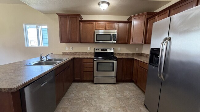Building Photo - Beautiful 2-Story Townhome with Finished Basement