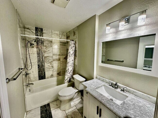 Building Photo - AVAILABLE NOW! Charming 3-Bedroom Retreat ...