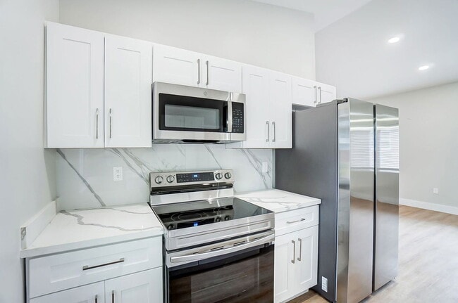 Building Photo - 3719 Kirkup Ave