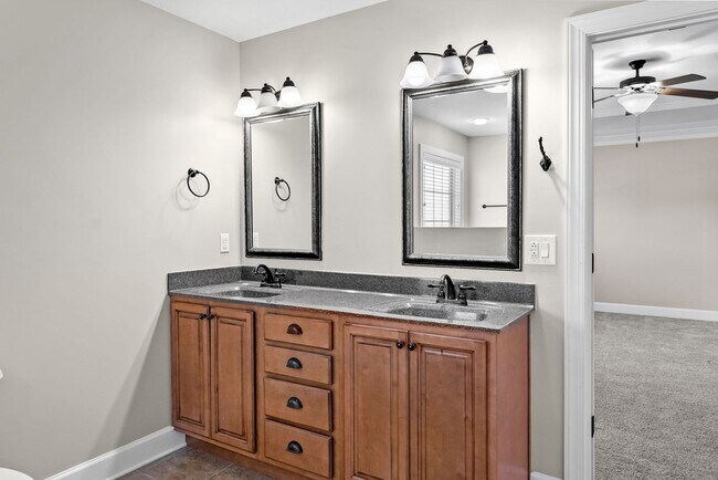 Building Photo - Pet Friendly Three Bedroom with Bonus!
