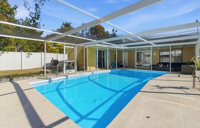 Building Photo - Charming Sarasota Retreat –4-Bedroom/3-Bathroom Modern Pool Home Near Everything!