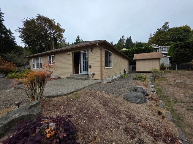 Building Photo - One-Story Home with Sound View in a Desira...
