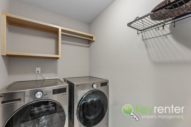 Building Photo - Spacious 4-Bedroom Home with Finished Basement & 3-Car Garage – Derby, KS