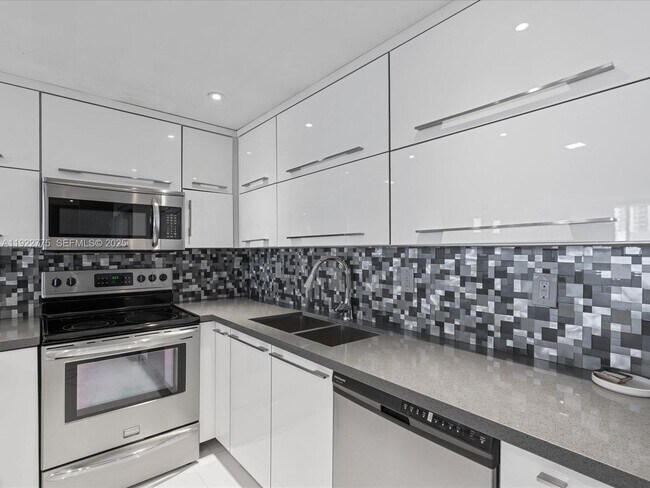 Building Photo - 19370 Collins Ave