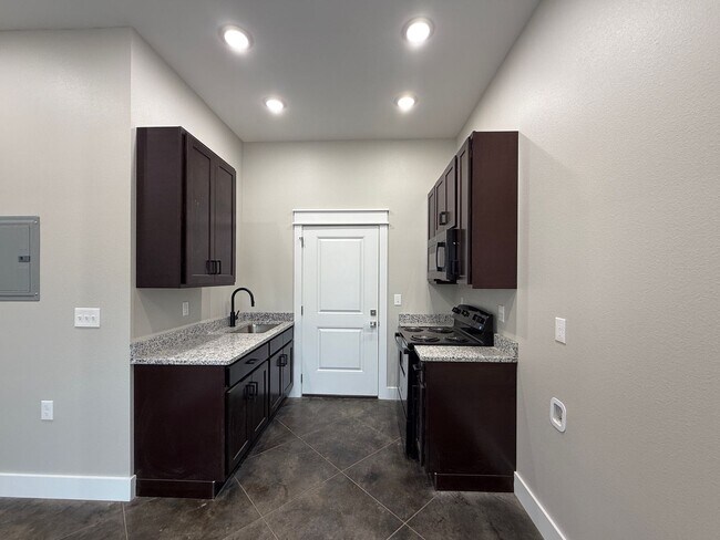 Building Photo - New Construction - Studio 16 Luxury Studio Apartments- Close to Lyon College