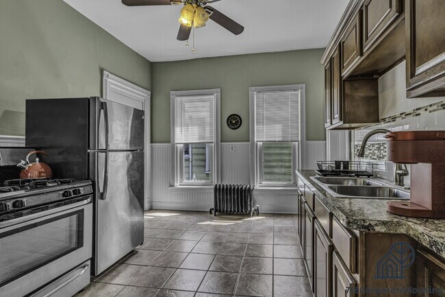 Building Photo - Furnished 2-Bedroom Second-Floor Apartment Near Elmwood Village