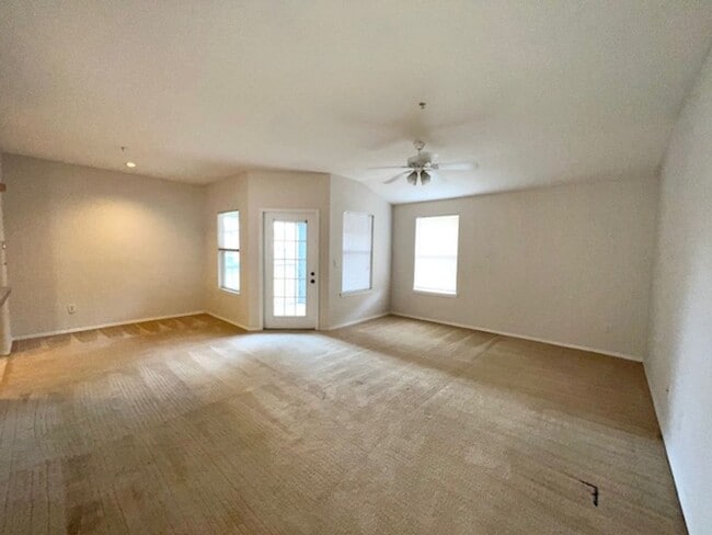 Building Photo - Move in NOW- Spacious 2 bedroom 1 bath condo on 3rd floor in gated community! Water included with...