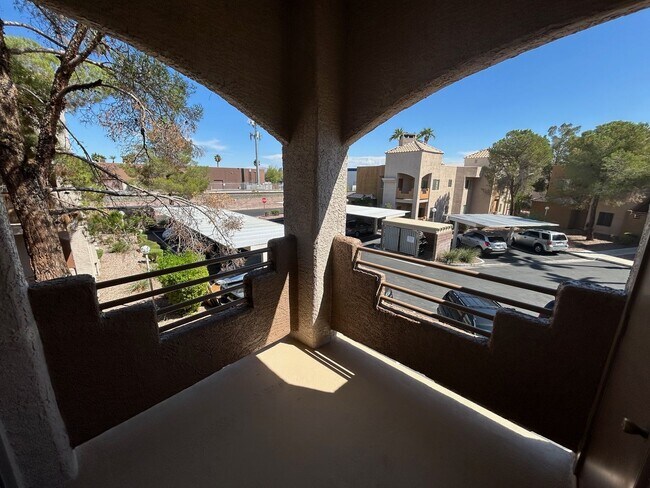 Building Photo - INVITING 2 BEDROOM TOP FLOOR CONDO IN A CE...