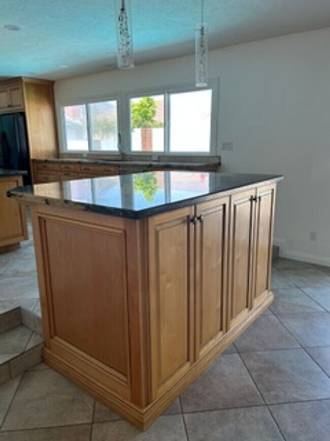 Building Photo - Spacious 4BR Home with Gated Pool, Chef’s Kitchen & 3-Car Garage
