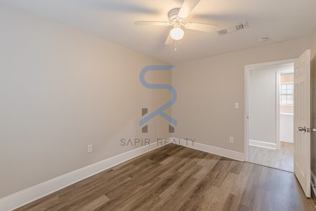 Building Photo - Move in before January 15th and choose your reward: a $250 Amazon Gift Card or a 55" Smart TV!