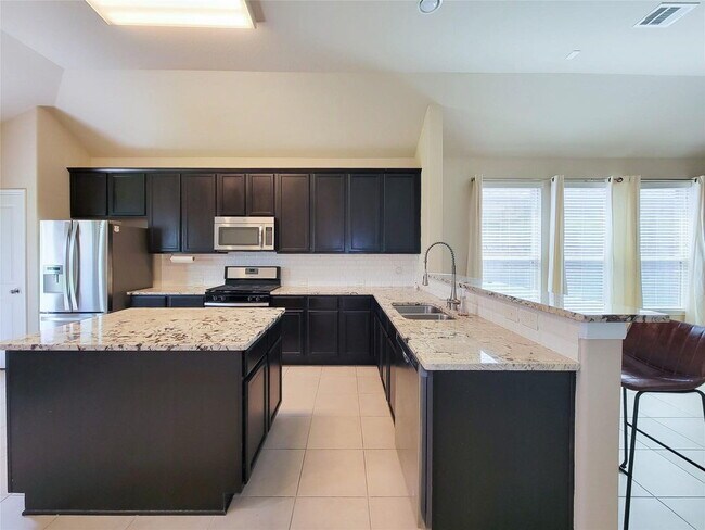 Building Photo - "Charming 3-Bed, 2-Bath Retreat in Humble, TX – Your Perfect Home Awaits on Justin Ridge Ln!"
