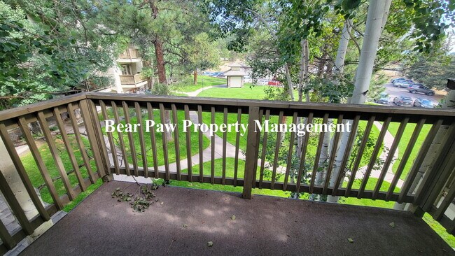 Building Photo - "Charming 2-Bed Condo with Cozy Fireplace in Scenic Evergreen!"