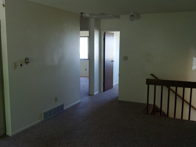 Building Photo - Widefield side entry bi-level home.