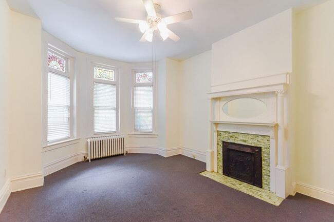 Large bedroom with Stain glass and baywindow - 1617 W Grace St