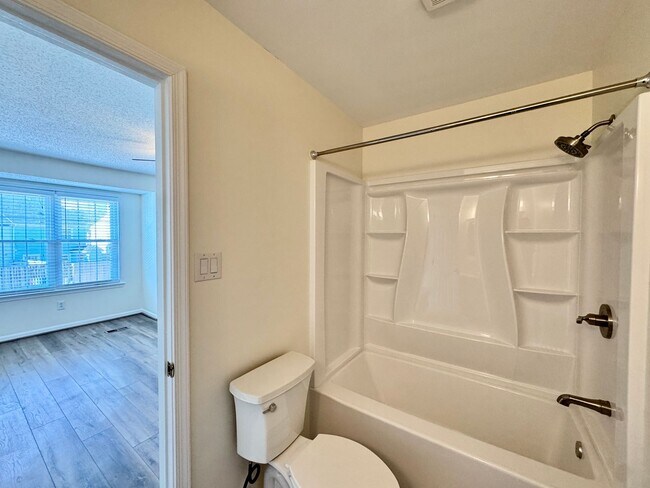 Building Photo - Completely Renovated & Ready 02-25-26! 2 Primary Suites, All Appliances Convey and Dog-Friendly!