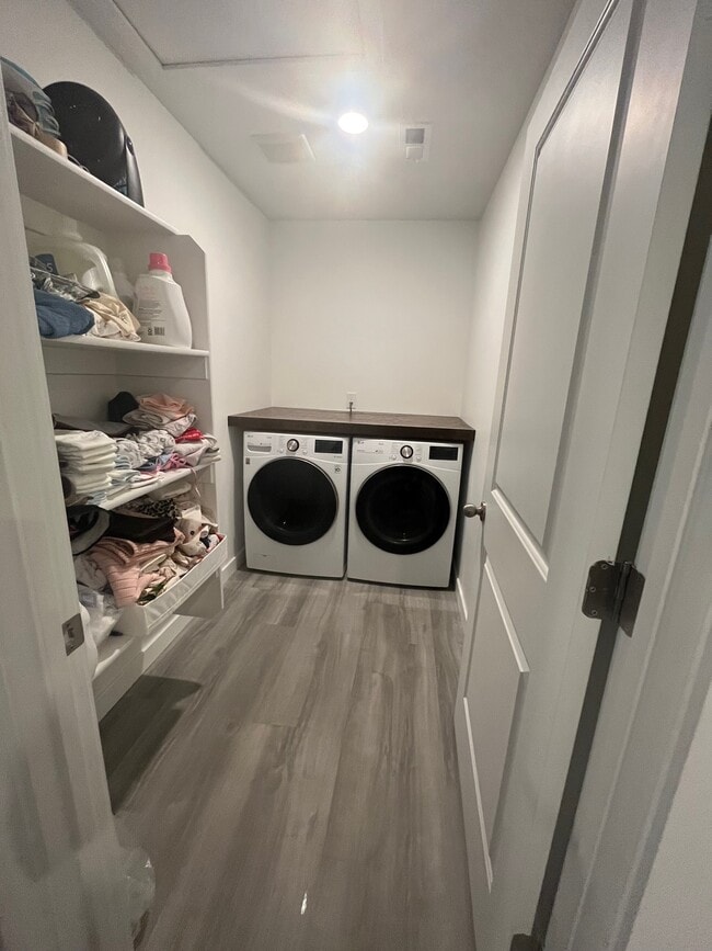 Laundry Room with shelving and built in laundry counter - 2804 N Airmen Ave