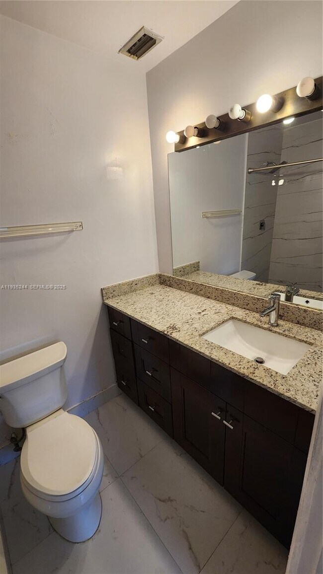 Building Photo - 3090 Coral Springs Dr