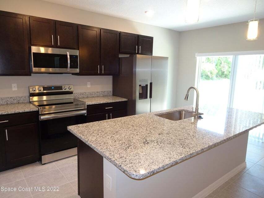 Kitchen with Island - 701 Avalon St SE