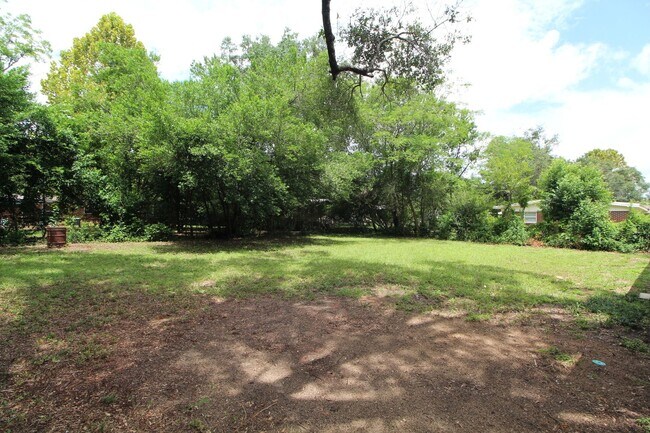 Building Photo - 4BR Home with LVP Flooring, Open Layout & Large Backyard Near Dogwood