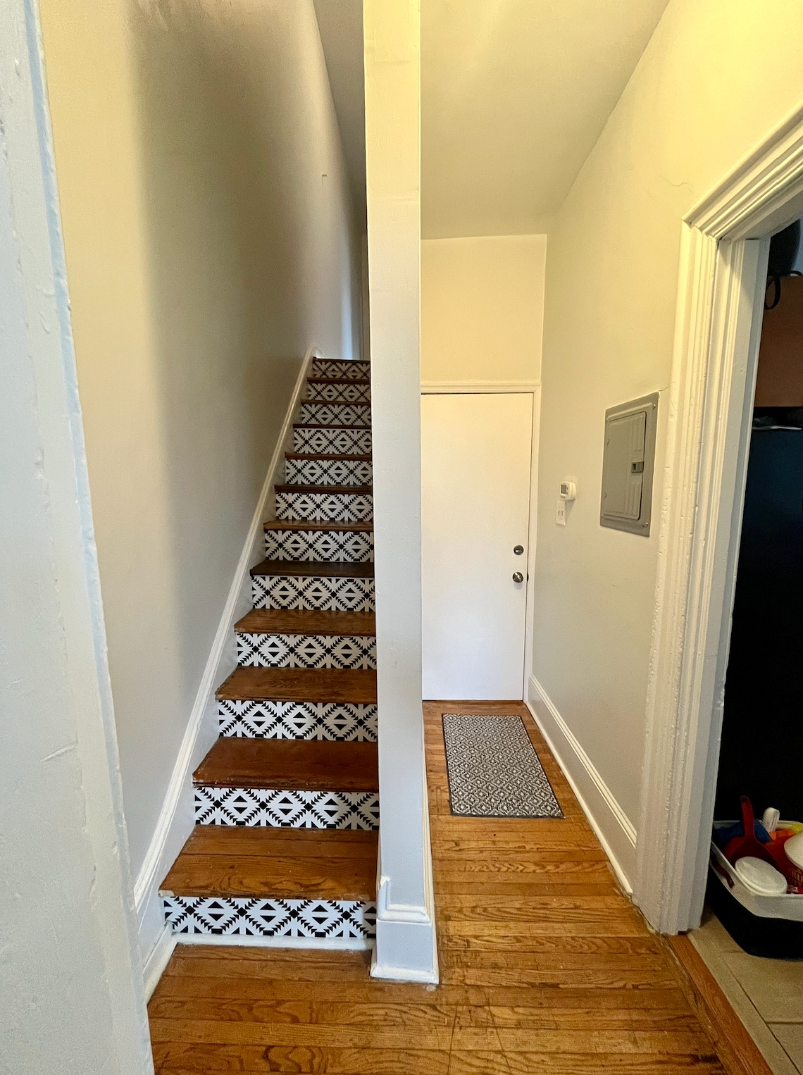 Interior stairs and apartment door - 3702 Spring Garden St
