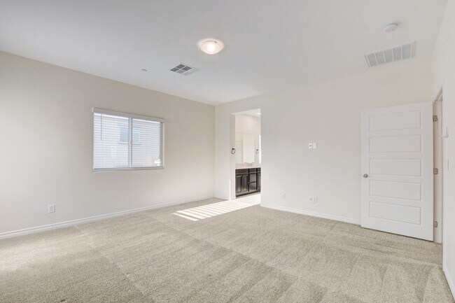 Building Photo - 4 Bedroom Townhouse in Tule Springs Coming Soon!