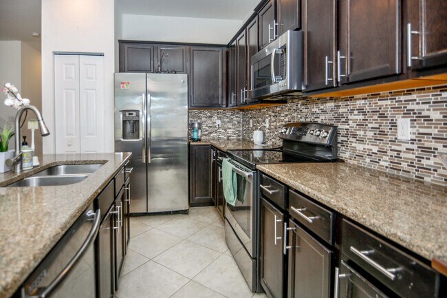 Building Photo - 10373 Wellington Parc Dr