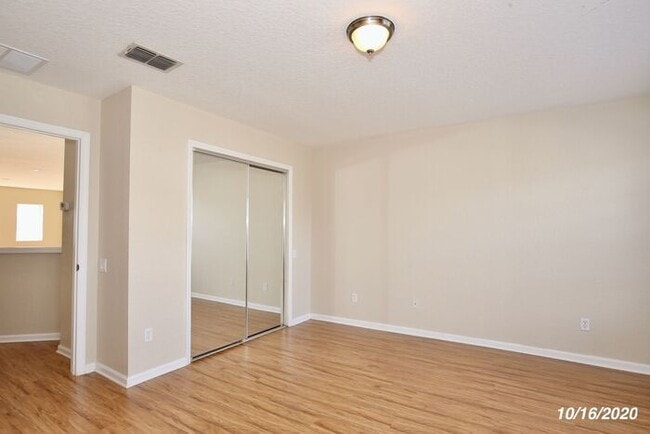 Building Photo - Beautiful 3/3.5 Townhome with a Spacious 2 Car Garage in the Gate Guarded Community of Spring Isl...