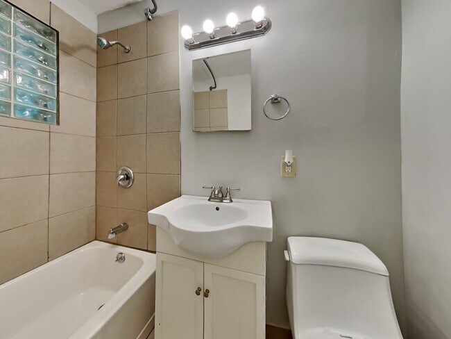 Building Photo - Charming 3-Bedroom Home with Sunroom, Fireplace & Garage in Kansas City, MO!