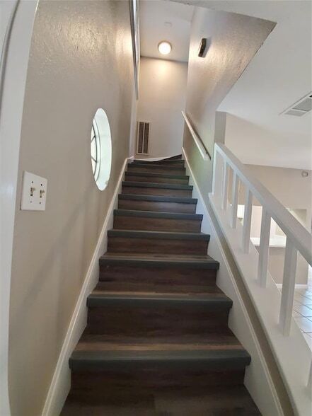 Building Photo - 9008 Sanger Dr