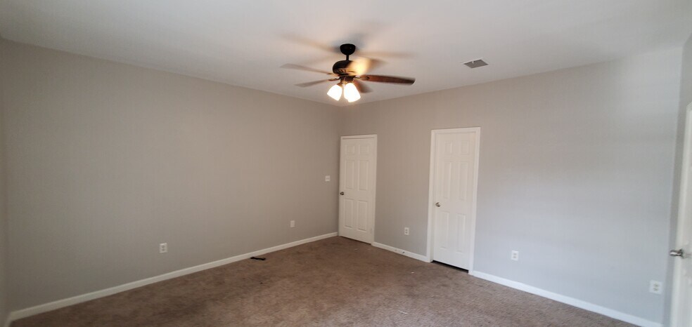 Door on left hallway, Door on right Bath #1 located inside of bedroom - 16513 W Sandy Meadows Dr