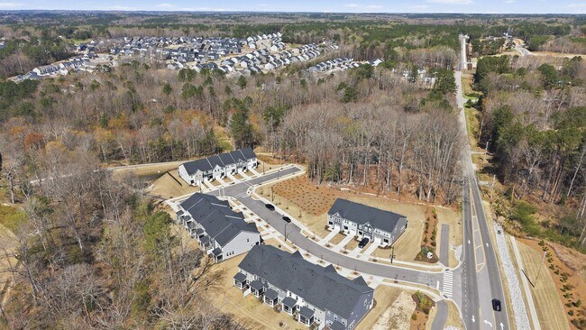 Building Photo - Upgraded 3BR Townhome in Wake Forest | Open Layout, Garage & Resort-Style Amenities