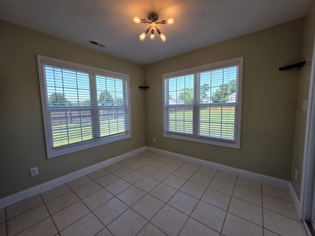 Building Photo - Spacious 4-Bedroom Bryan Farms Beauty with Bonus Suite, Large Fenced Yard & RV/Boat Parking!