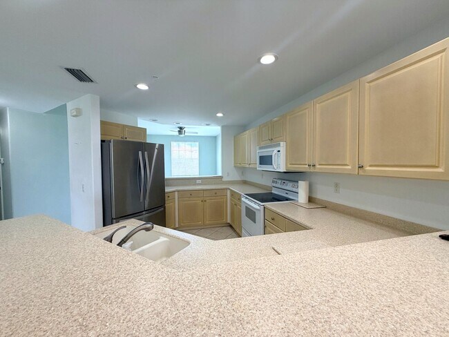 Building Photo - FIRST MONTH'S RENT FREE! 2/2 Condo in SW Cape Coral, Resort Style Living!