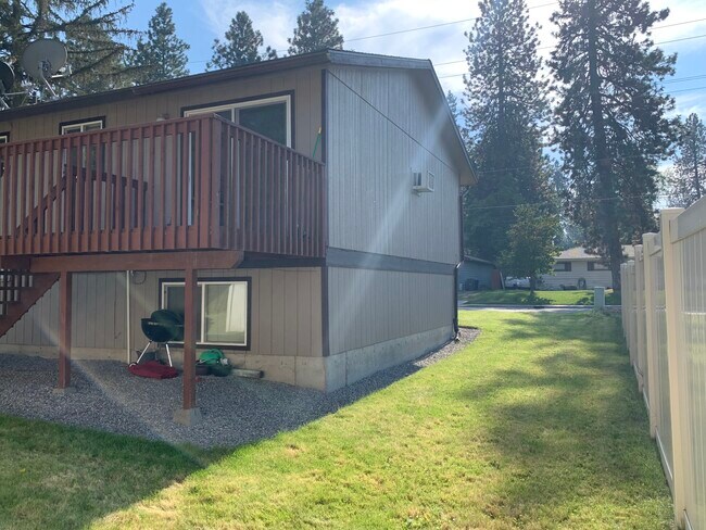 Side yard - 11325 E 16th Ave