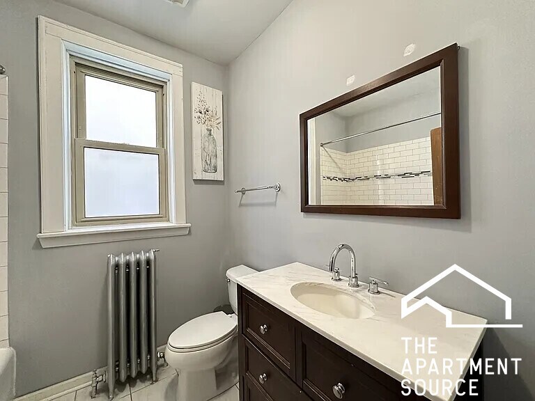 Building Photo - 5023 N Ridgeway Ave