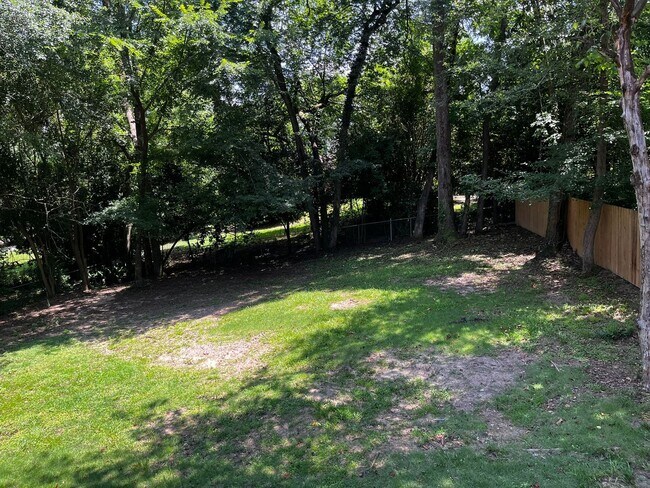 Building Photo - Must See the Sunroom off the Primary Bedroom!