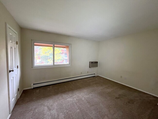 Building Photo - Bright 3BR Condo in Central Fort Collins with Parking| $300 Off First Month
